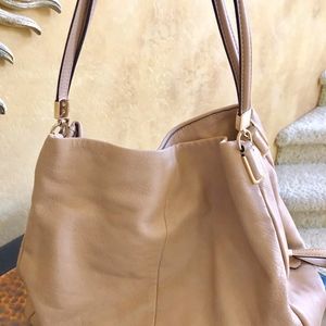 Tan leather roomy Coach bag